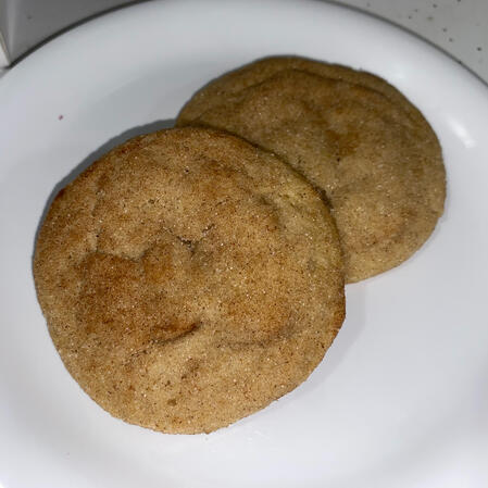Snickerdoodles - A sugary, cinnamon cookie coated in cinnamon sugar, with a warm, slightly tangy flavor and a perfectly chewy texture.